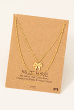 Load image into Gallery viewer, Gold Dipped Knotted Ribbon Bow Pendant Necklace
