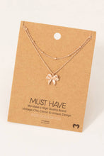Load image into Gallery viewer, Gold Dipped Knotted Ribbon Bow Pendant Necklace
