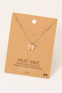 Gold Dipped Knotted Ribbon Bow Pendant Necklace