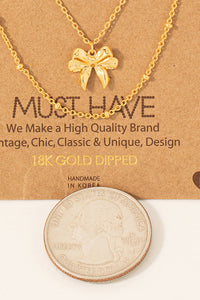 Gold Dipped Knotted Ribbon Bow Pendant Necklace